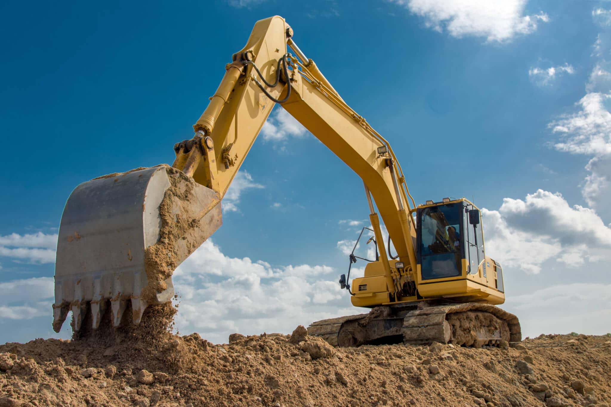 Excavator digging at a construction site
