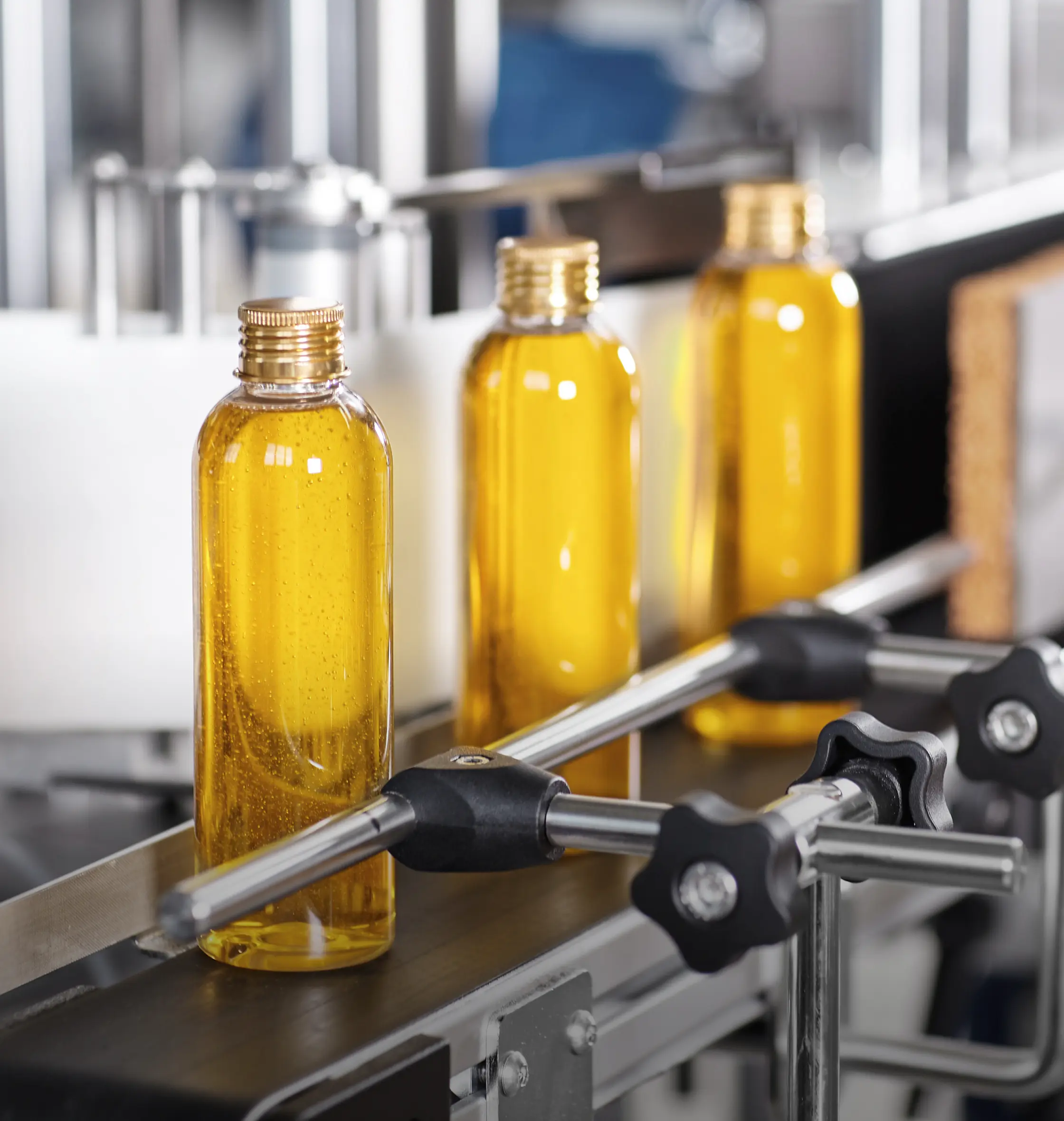 Bottles moving along a production line