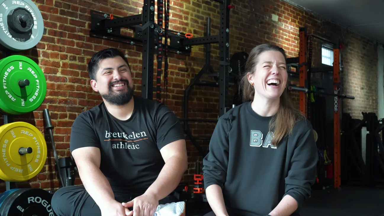 Breuckelen Athletic co-founders laughing in their gym