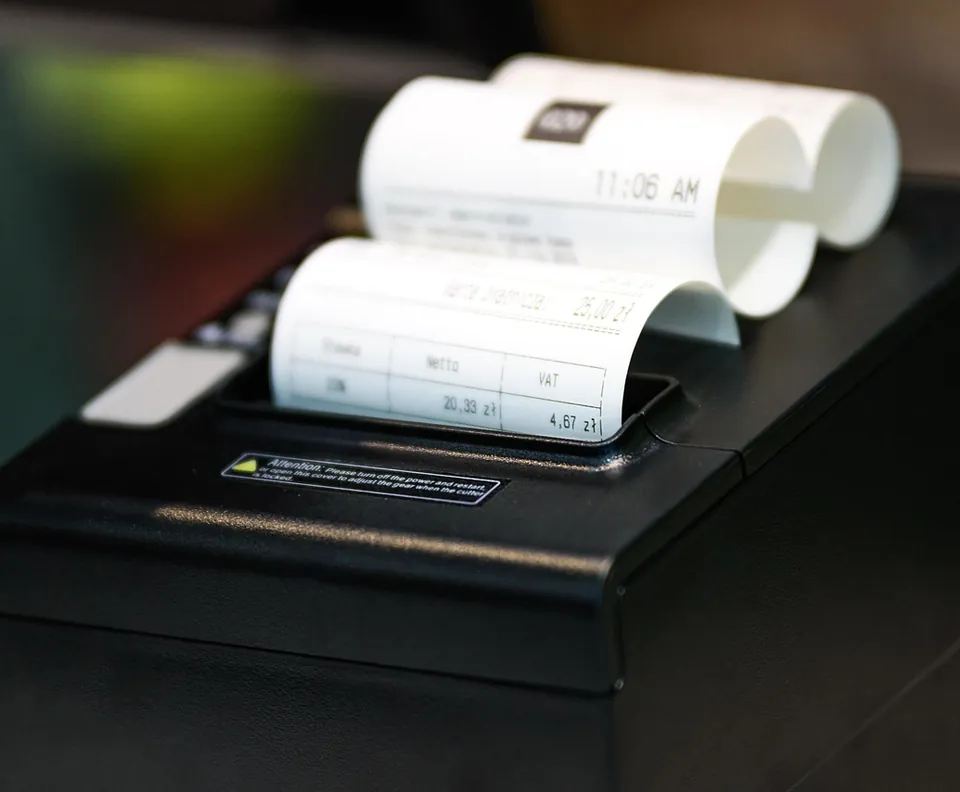 Receipt printer at a shop counter