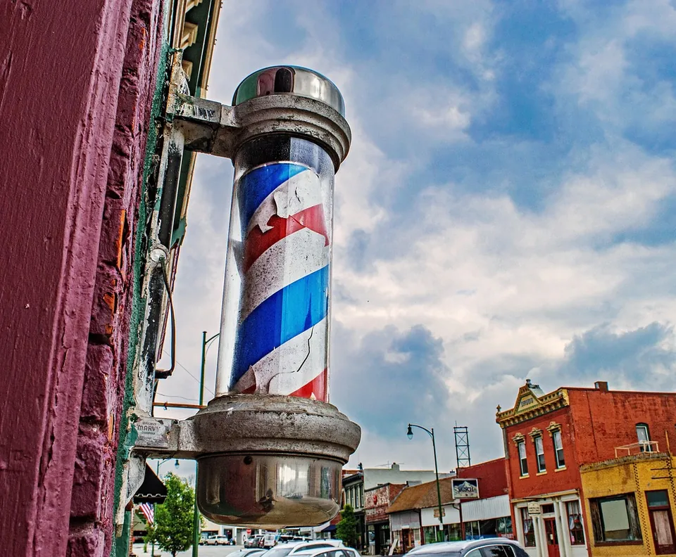 Barber pole on a main street