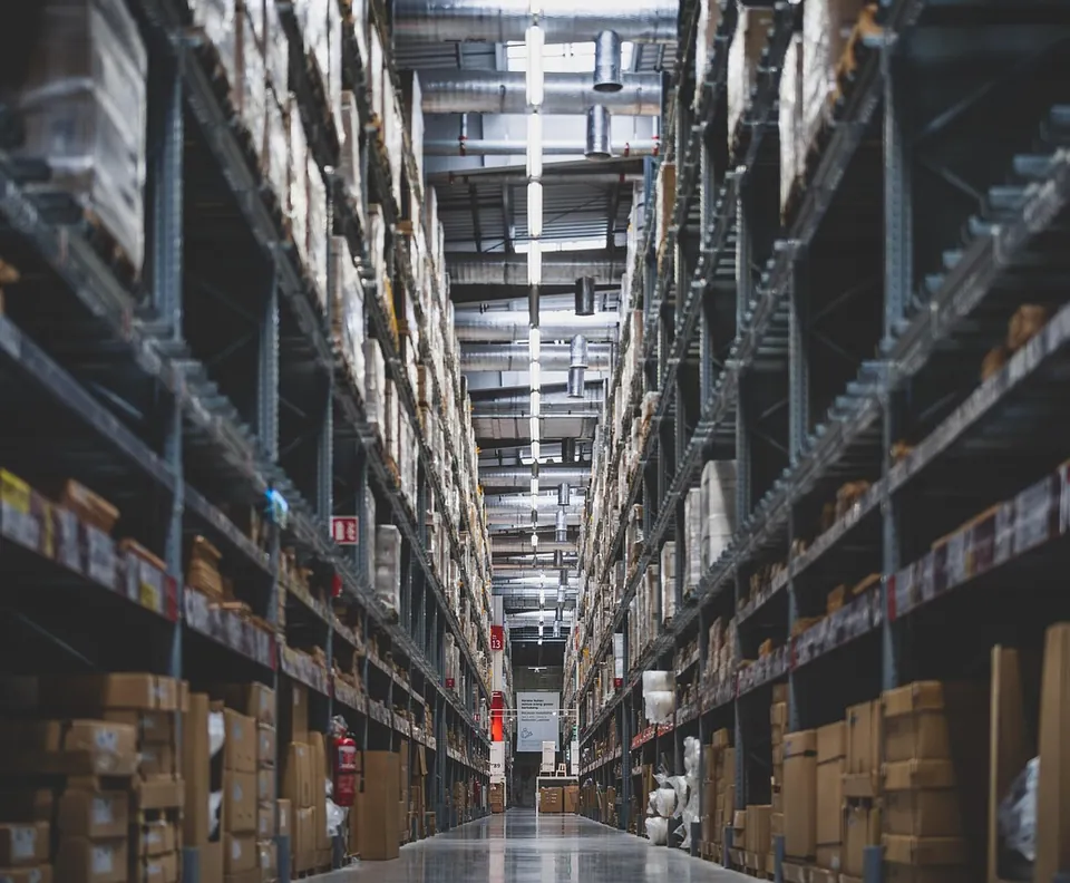 Warehouse aisle with stocked shelves