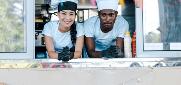 Restaurant staff wearing chef hats