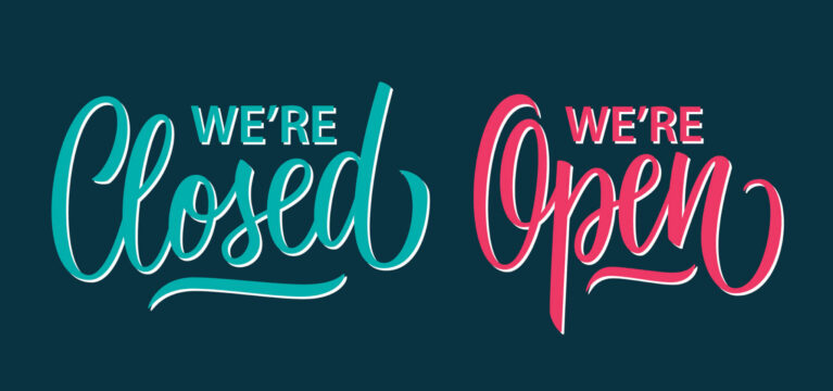We're Open and We're Closed handwritten inscriptions