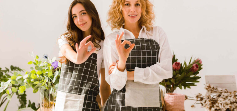 Two attractive young florists
