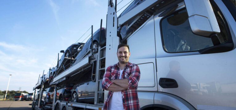 Portrait of smiling tow truck driver