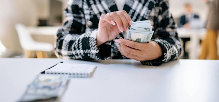 person counting money
